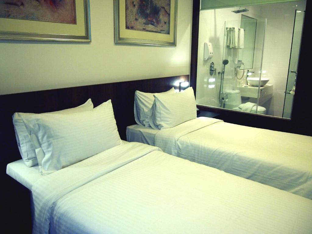 Cove D'Arena Lejlighedshotel Singapore Værelse billede