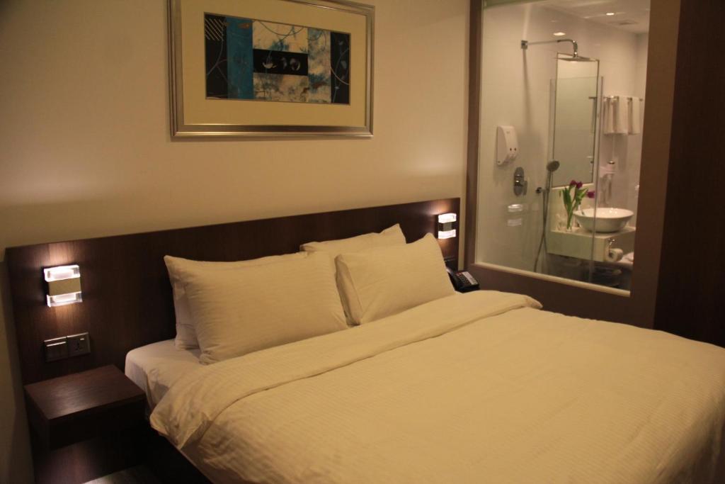 Cove D'Arena Lejlighedshotel Singapore Værelse billede